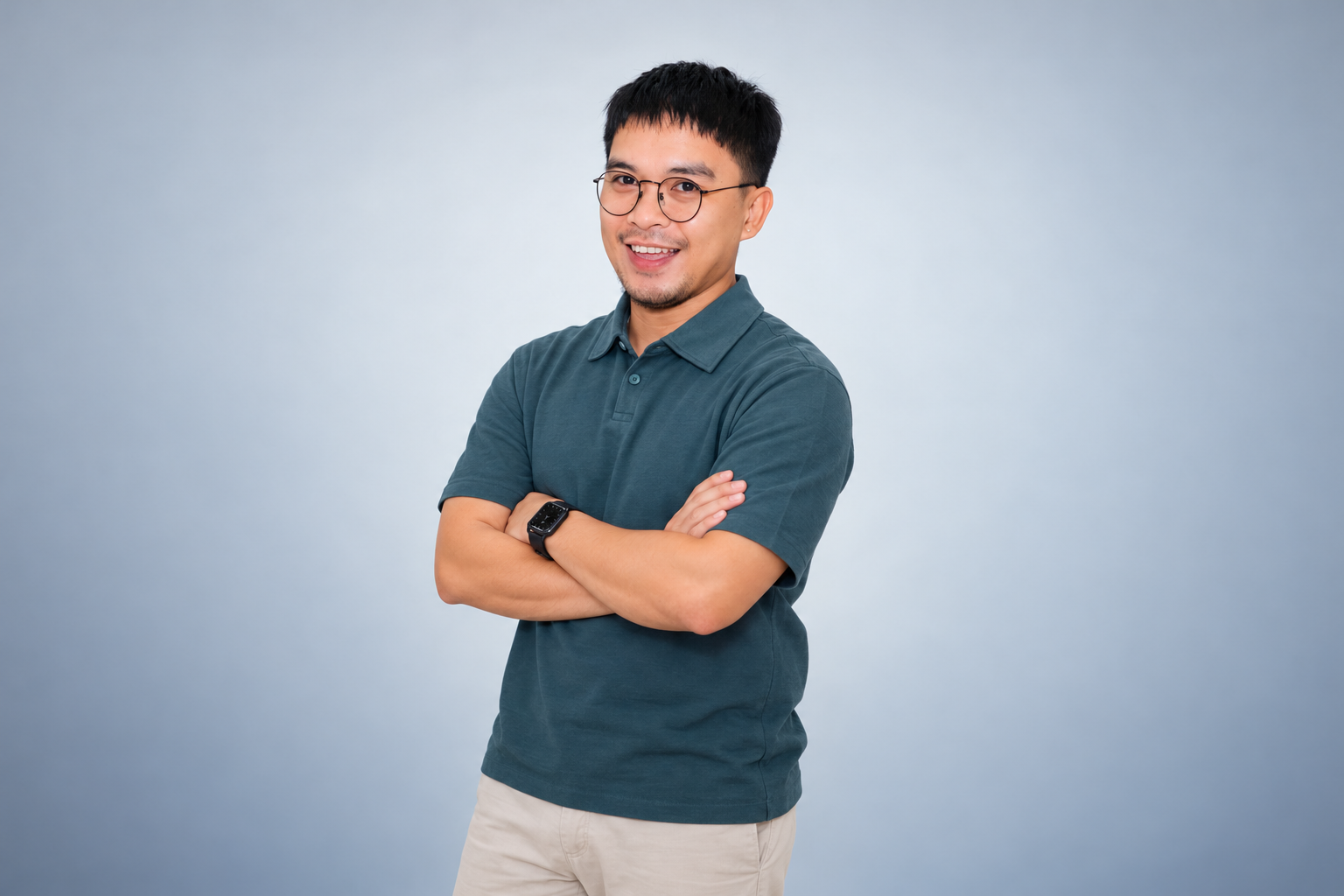 Arleigh Jr Cabal Orozco in a teal polo against a studio background